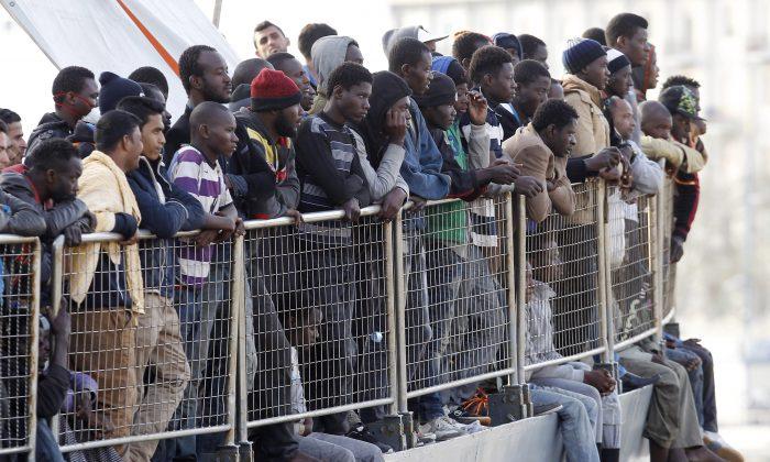 Milan Appeals for Help Managing Migrants