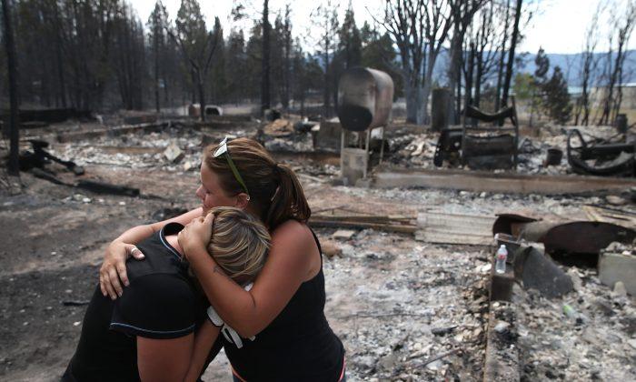 California Wildfire Evacuees Return Home as Flames Ease