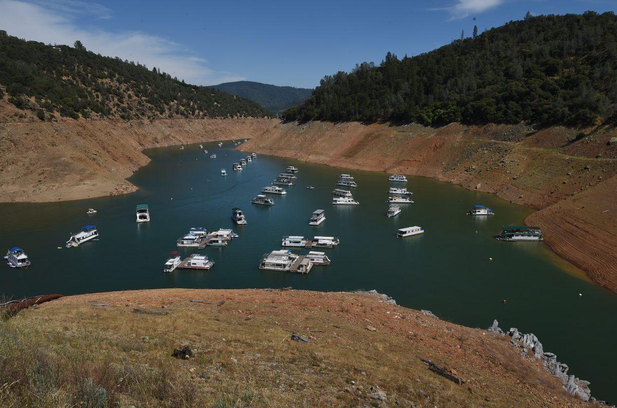 Houseboats are moored on a shrinking arm of the Oroville Lake reservoir which is now at less than 25 percent capacity as a severe drought continues to affect California on May 24, 2015. (Mark Ralston/AFP/Getty Images)