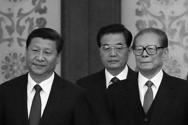 Chinese Communist Party General Secretary Xi Jinping (L) and his predecessors Hu Jintao and Jiang Zemin (R) in the Great Hall Of The People on Sept. 30, 2014 in Beijing, China. Since being installed in office in November 2012, Xi has led a campaign that is uprooting Jiang Zemin's influence in the Party. (Feng Li/Getty Images)