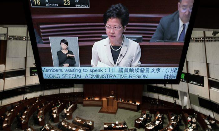Debate on Hong Kong Election Plan Begins