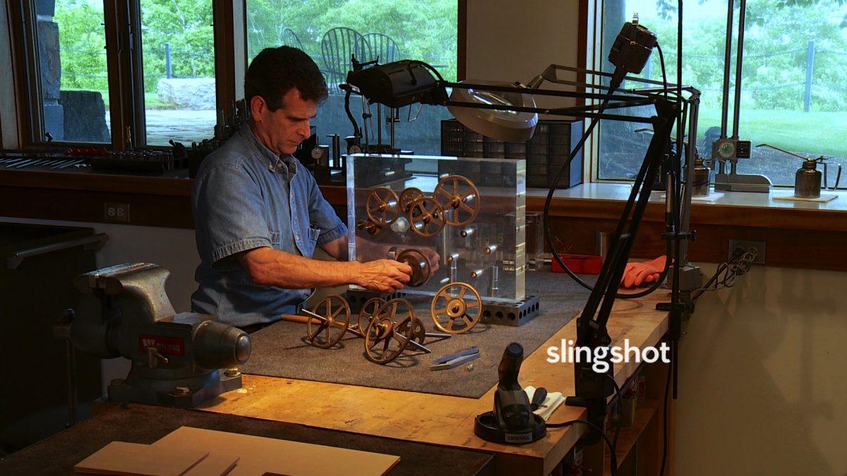 Dean Kamen building a clock in "Slingshot." (DEKA Research and Development/White Dwarf Productions)