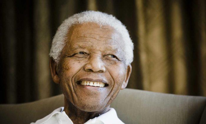 Nelson Mandela on Life Support as Emotion in S. Africa Builds