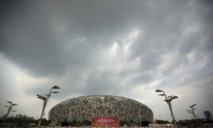 Beijing Accepts $3.9 Billion Olympic Price Tag for Image Building Exercise
