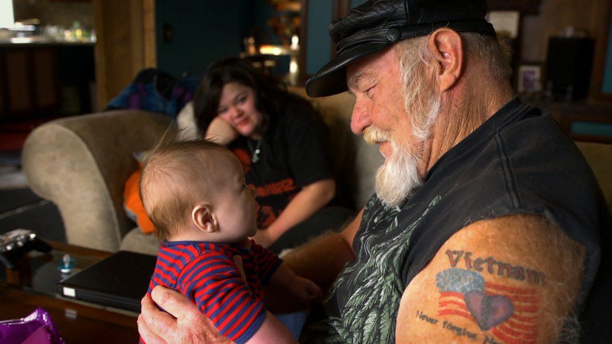 Ron "Stray Dog" Hall with great-grandson Teddy in the documentary film "Stray Dog." (Still Rolling Productions)