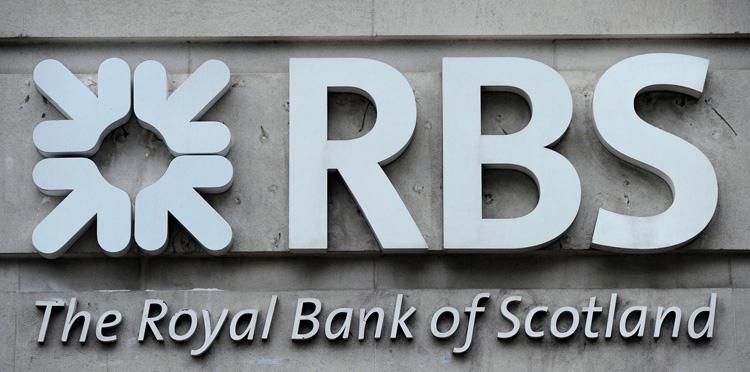 A Royal Bank of Scotland (RBS) sign is pictured outside a branch in central London on Oct. 7, 2011. (Carl Court/AFP/Getty Images)