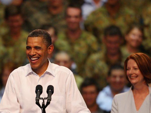 President Barack Obama addresses the troops at RAAF Darwin as Australian Prime Minister Julia Gillard looks on during the second day of his 2-day visit to Australia, on Nov. 17, 2011, in Darwin, Australia. (Scott Barbour/Getty Images)