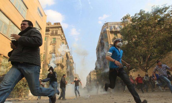 Dozens Dead in Egypt Clashes as Cabinet Submits Resignation