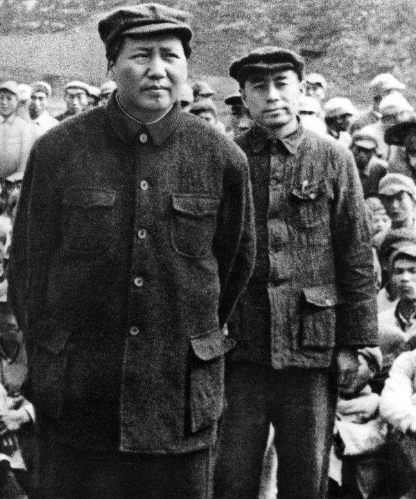 Former Chinese Communist Party (CCP) Chairman Mao Zedong (L) and former CCP premier Zhou Enlai (R), pose for a picture in 1945. (AFP/Getty Images)