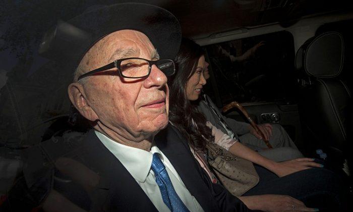 Murdoch Steps Down From Boards of UK Papers