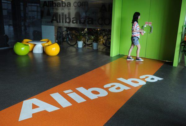 An Alibaba employee walks through a room at the company headquarters in Hangzhou, China, on June 20, 2015. (Peter Parks/AFP/GettyImages)