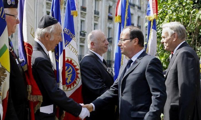 Hollande Acknowledges French Role in World War II Jewish Deportation