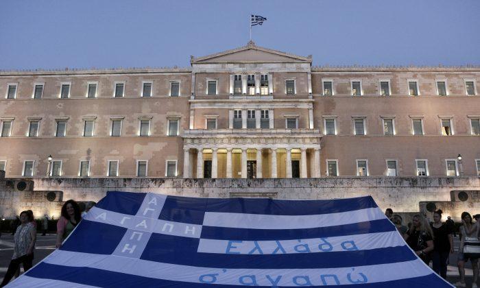 Greece Gets Relief From Creditors After First Austerity Test