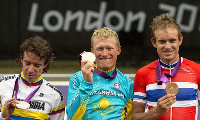 Vinokourov Surprise Winner of Olympic Cycling Gold