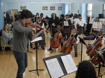Violinist Joshua Bell Rehearses With Inner-City Kids