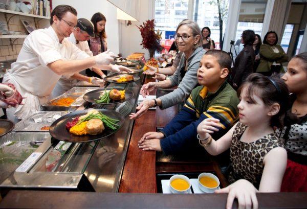 Book a nice local restaurant at your vacation destination in advance can make sure your family will enjoy a good local meal when you arrive there. (Samira Bouaou/The Epoch Times)