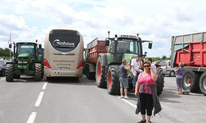 French Farmers Block Alpine Roads Over Low Meat, Milk Prices