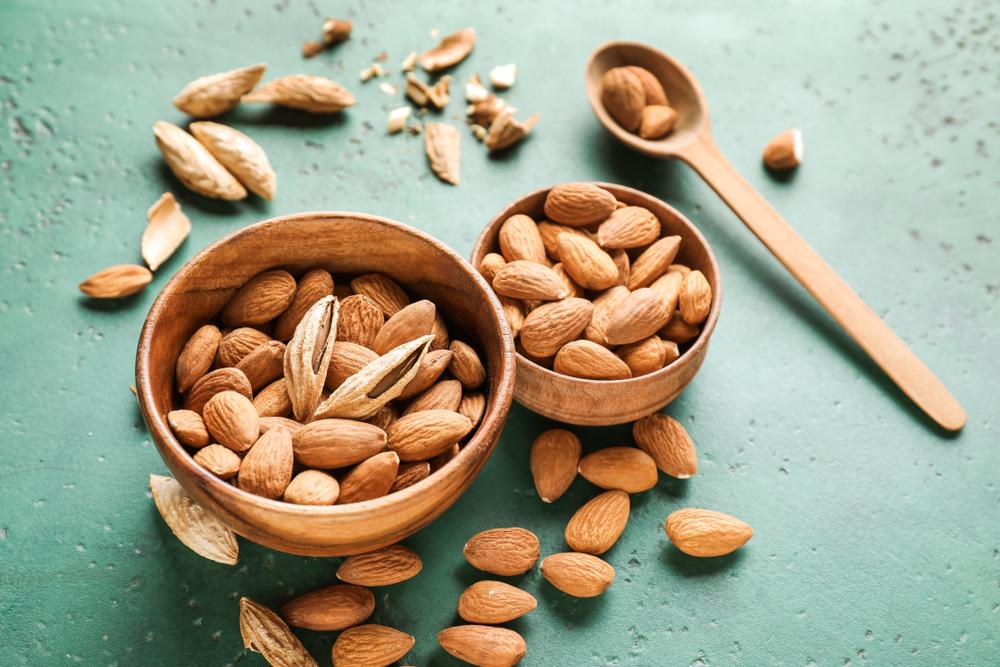 Soaking almonds for eight hours helps release those enzymes and effectively "sprouts" them, which makes the almonds much more digestible and alive. (Pixel-Shot/Shutterstock)