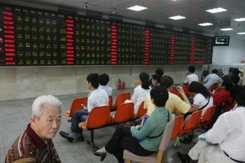 China Stock Market Dives on Olympics Opening