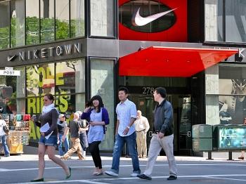 Chinese Go Overseas to Buy Their Nikes and Handbags