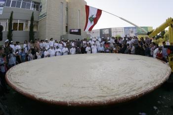 Hummus World Record: 12 Tons of Hummus in a Satellite Dish
