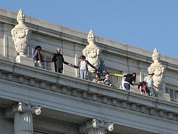 UC Berkeley Students Protest Education Cuts Atop Campus Building Ledge