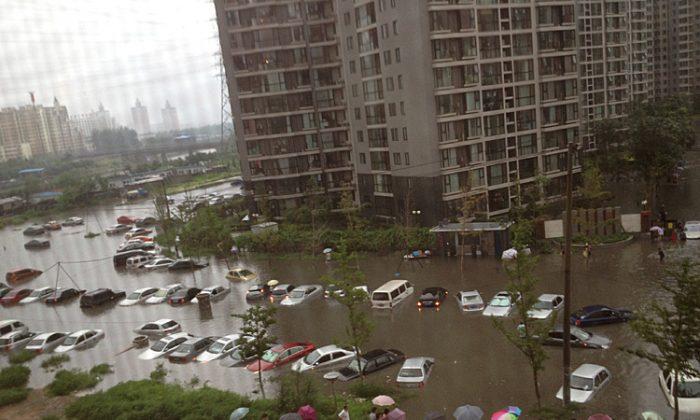 Beijing Floods, Worst in Six Decades, Displace Thousands, Kill at Least 37