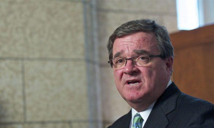 Oxfam Urges Flaherty to Combat Land Grabs in Poor Nations