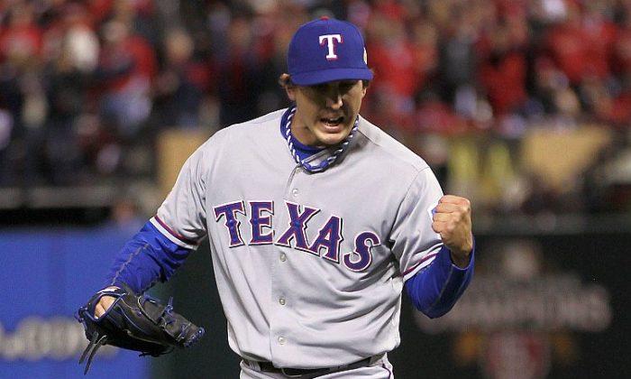 Rangers Sign Pitcher Holland For Five Years