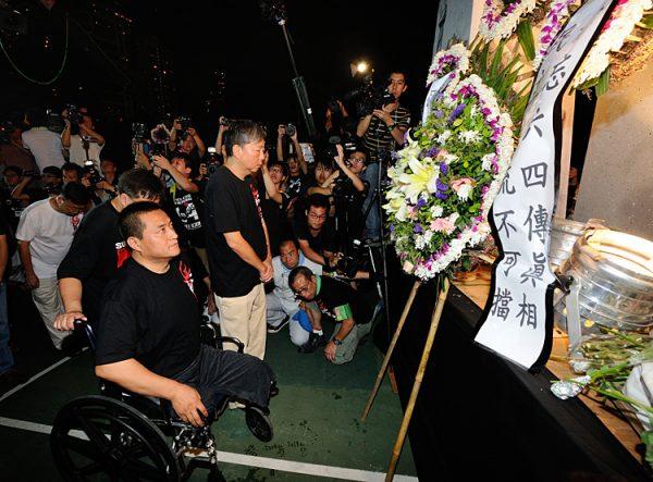 Over 180,000 people participated in a candlelight vigil in memory of the victims of the 1989 Tiananmen massacre, where an unprecedented mass demonstration was cleared up by soldiers dispatched by the Chinese communist regime. The number of people who attended on June 4, 2012, set a new record. (Sung Pi Lung/The Epoch Times)