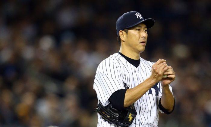 Kuroda re-signs with the Yankees