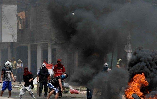 Clashes in Peru’s Capital Leave Two Dead