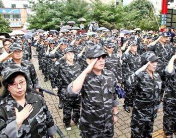 Former North Korean Soldiers Wield Phones Instead of Guns