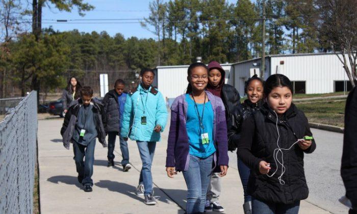 Students Take a Walk With ‘The Walking Classroom’