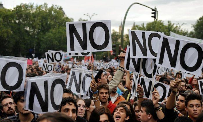 Protests Erupt Outside Spanish Parliament
