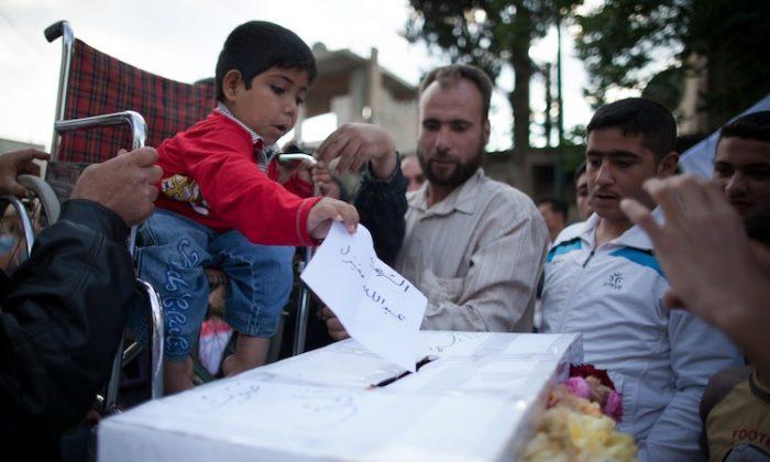 Syria Holds Elections Amid Violence, Boycotts