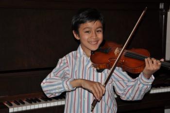 Nine-Year-Old Composer Debuts Piece with Mooredale Youth Orchestra