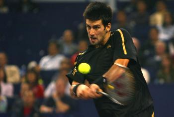 Djokovic Dominates Davydenko to Win Tennis Masters Cup