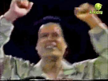 Libyan Television Sends Defiant Message, Shows an Adored Gadhafi