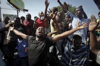Haiti Cholera Protests Spread to Capital
