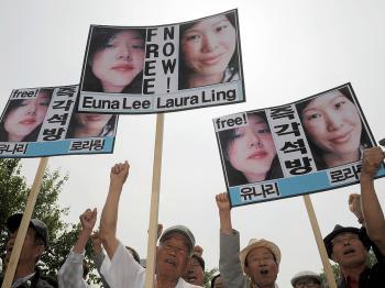U.S. Journalists Sentenced to 12 Years in North Korean Prison