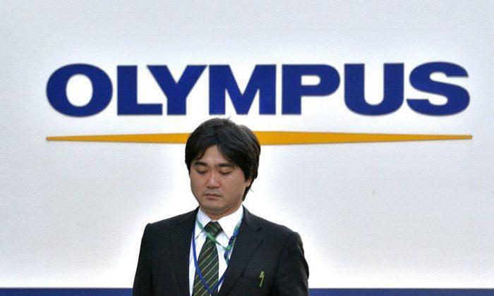 Olympus Sues Executives for Fraud