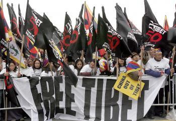 Tibetans March for 50th Anniversary of Uprising