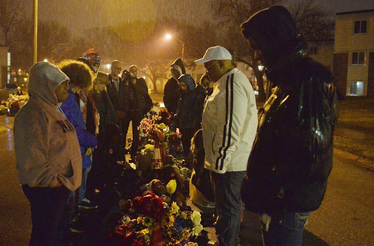 A group of protesters gather at the memorial for Michael Brown at Canfield Apartments in Ferguson, Mo., on March 13, 2015. (Michael B. Thomas/AFP/Getty Images)