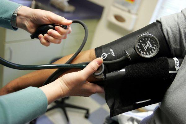 Health insurance can be a good investment. (Joe Raedle/Getty Images)