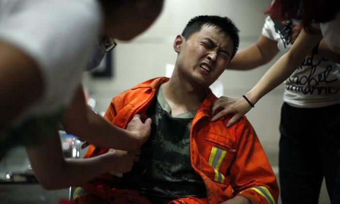 Firefighter Rescued From Blast Zone in China’s Tianjin Port
