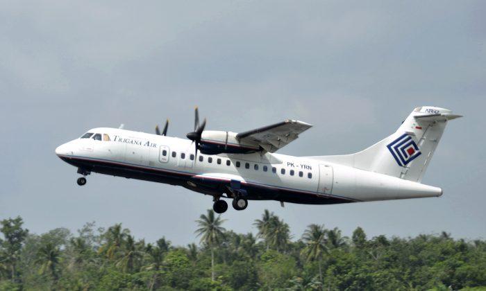 Indonesia Rescuers Head to Mountains in Missing Plane Search