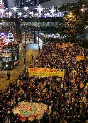China to Hint at Full HK Democracy by 2017