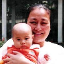 Beijing Female Falun Gong Practitioner Critically Beaten