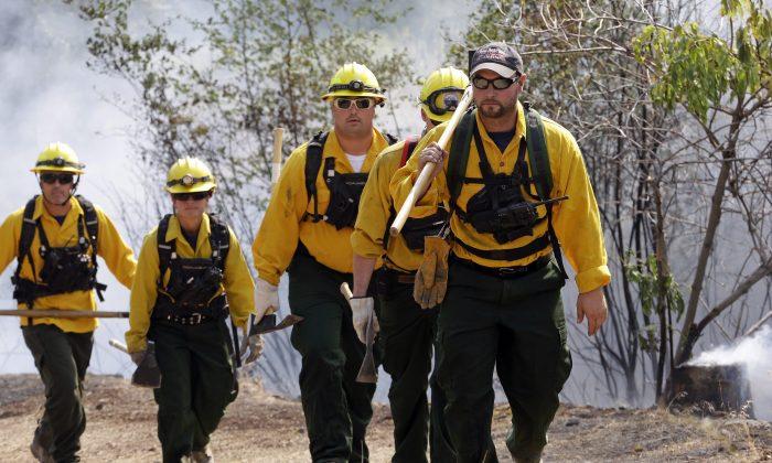 Firefighters Holding Their Own Against Giant Wildfire
